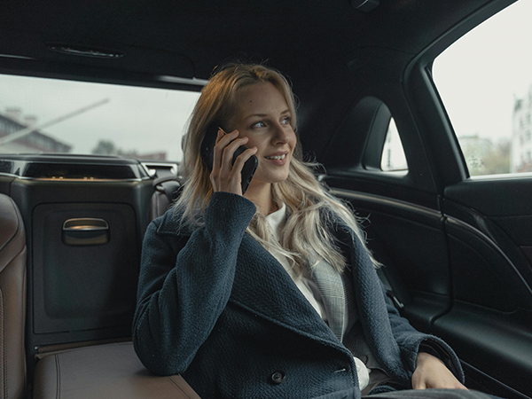 Chauffeur Waiting At London Heathrow Terminal 5 Arrivals With Name Board